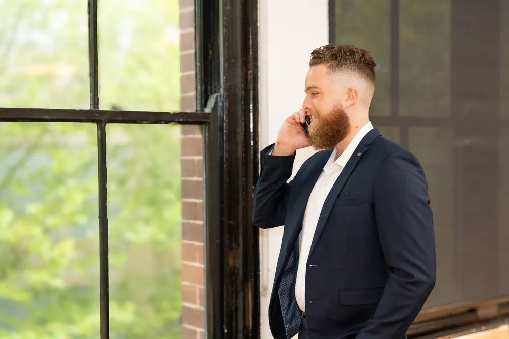 Sydney insurance broker on phone ready to discuss business insurance quotes and coverage options