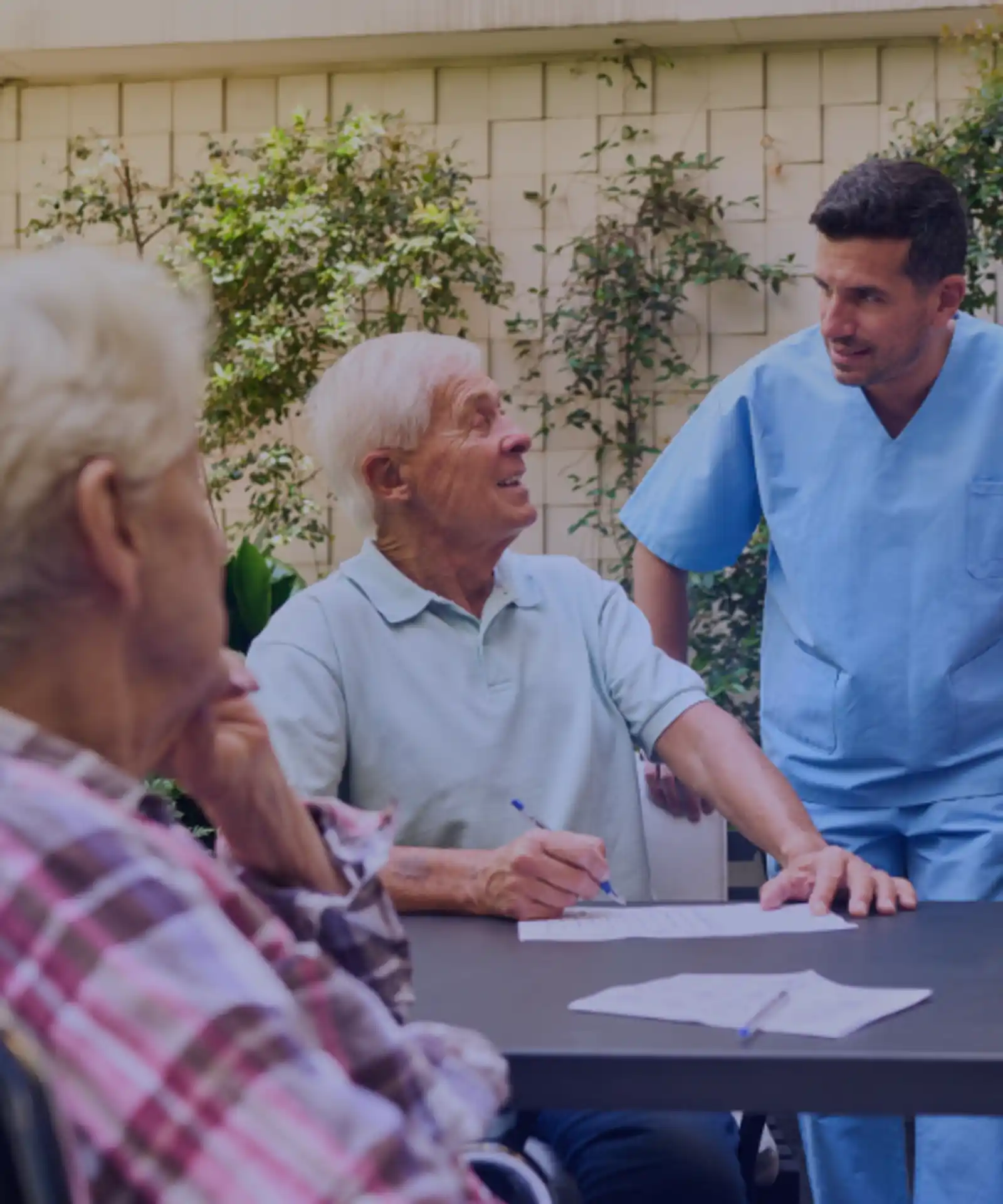 Support worker assisting a participant, insurance for NDIS providers and disability support workers