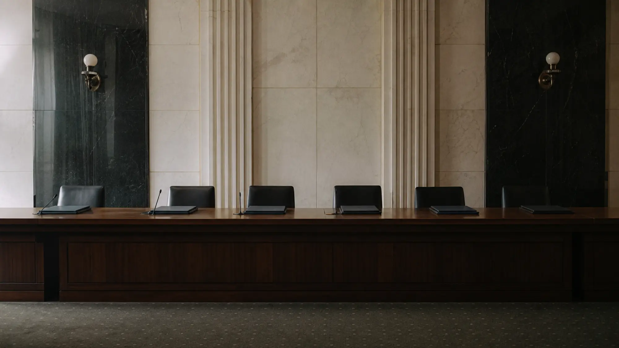 Hearing room table with chairs and folders, arbitrator professional indemnity insurance quote