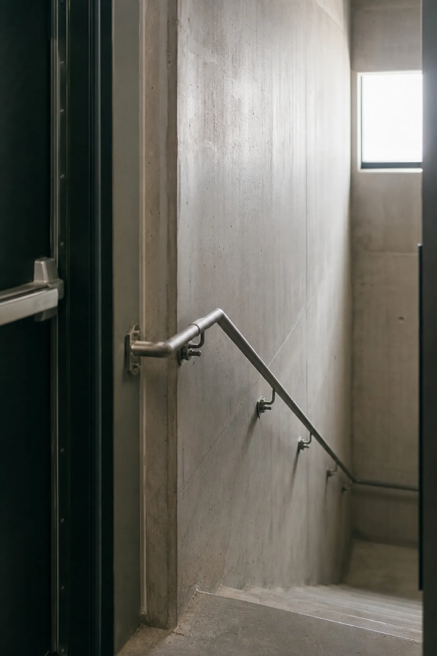 New fire stair and exit hardware, compliance detail under certifier PI insurance