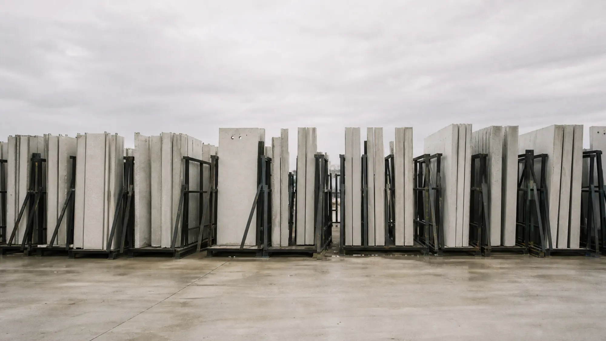 Precast concrete panels racked on a commercial site - contract works insurance for commercial builders