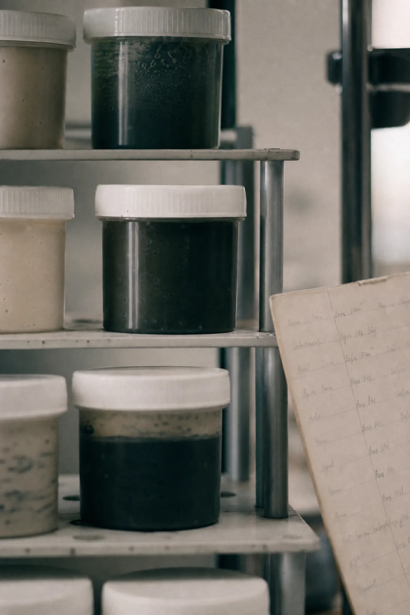 Trial formulation samples on a lab rack, coverage under food technologist PI insurance