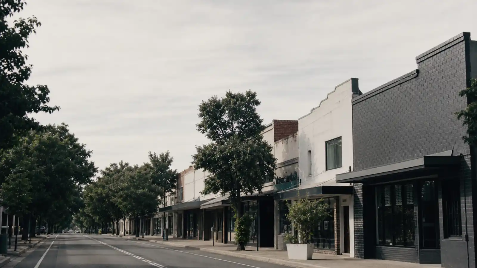 Australian commercial street of small businesses that get insured through a broker