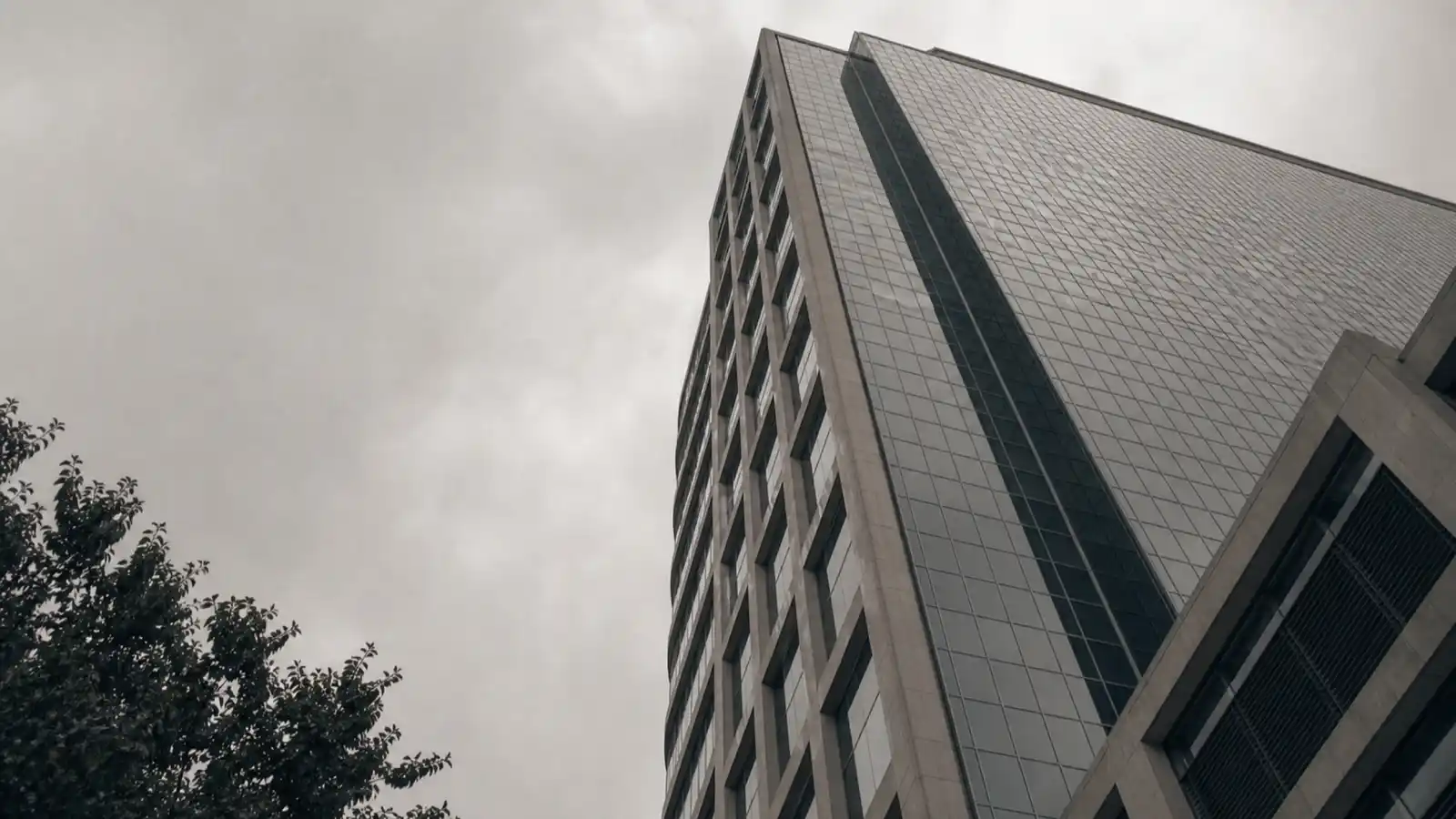 Commercial office tower facade representing high-limit professional indemnity insurance for major projects