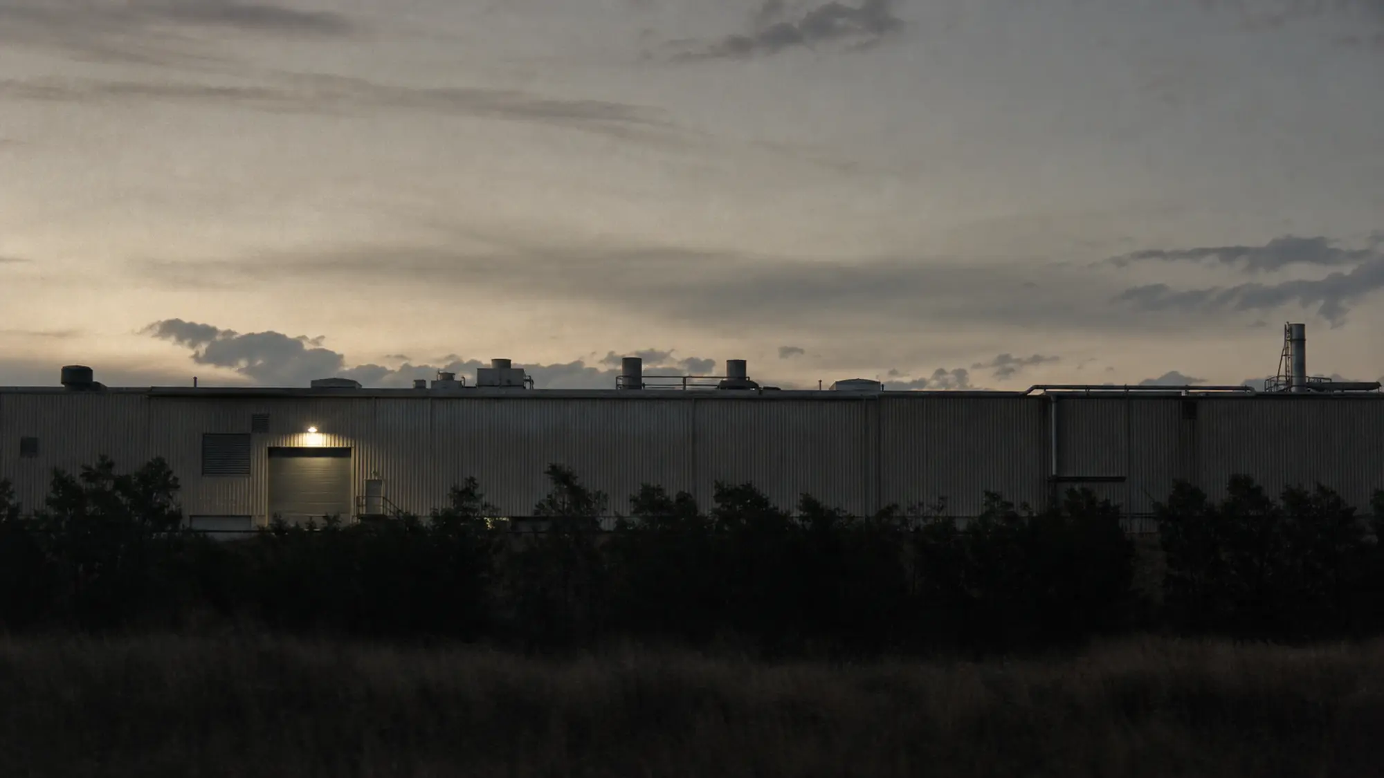 Australian industrial facility at dusk, the scale of asset an ISR insurance claim protects