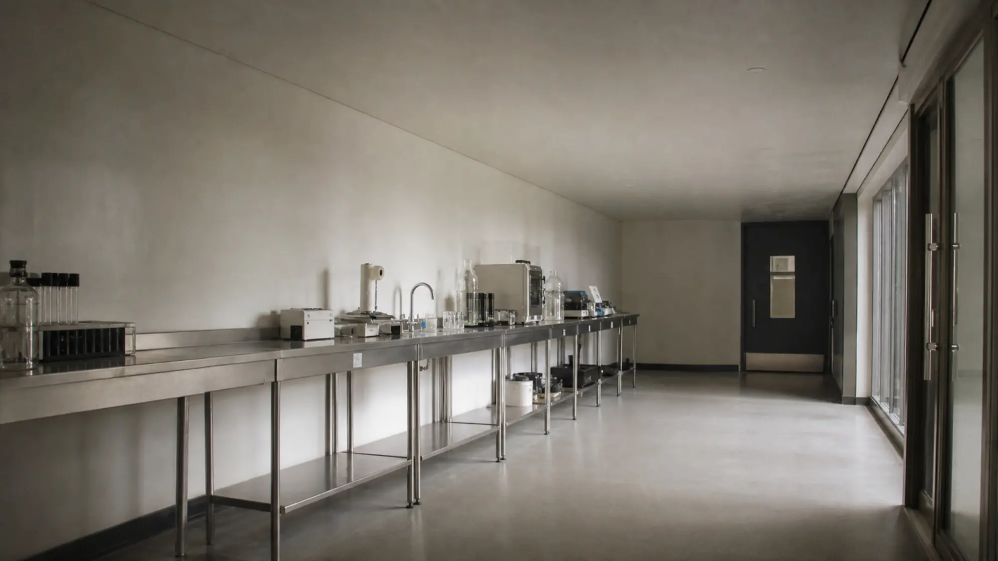 Quiet laboratory corridor representing specialist life sciences insurance placement