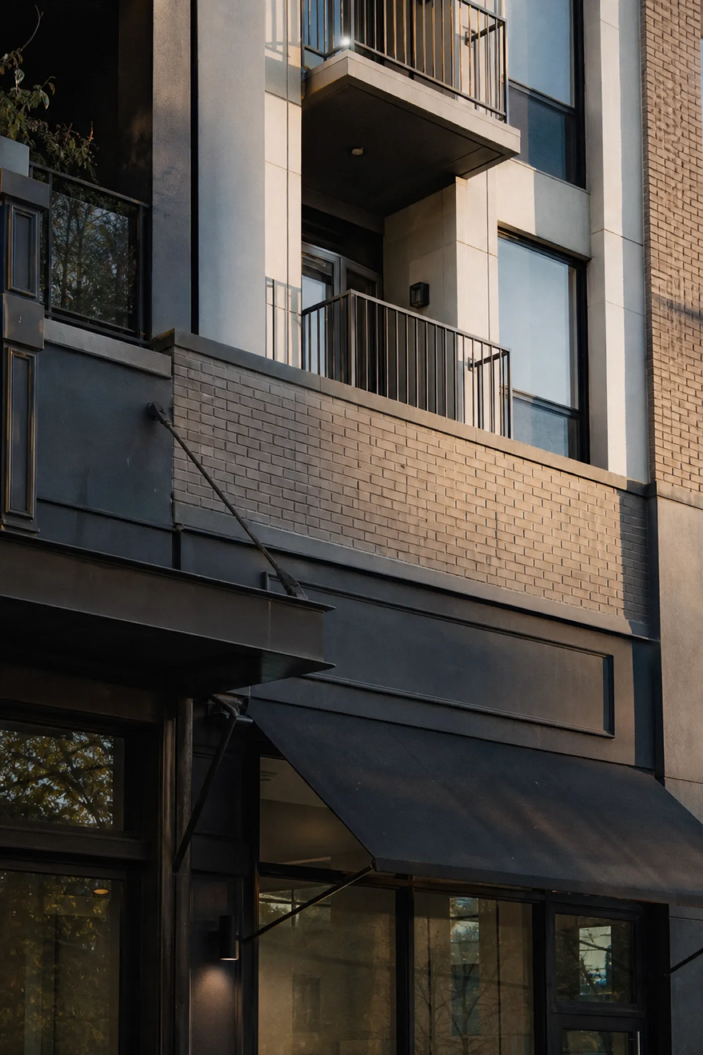 Facade rising from shopfront to apartments, one building under mixed-use strata insurance