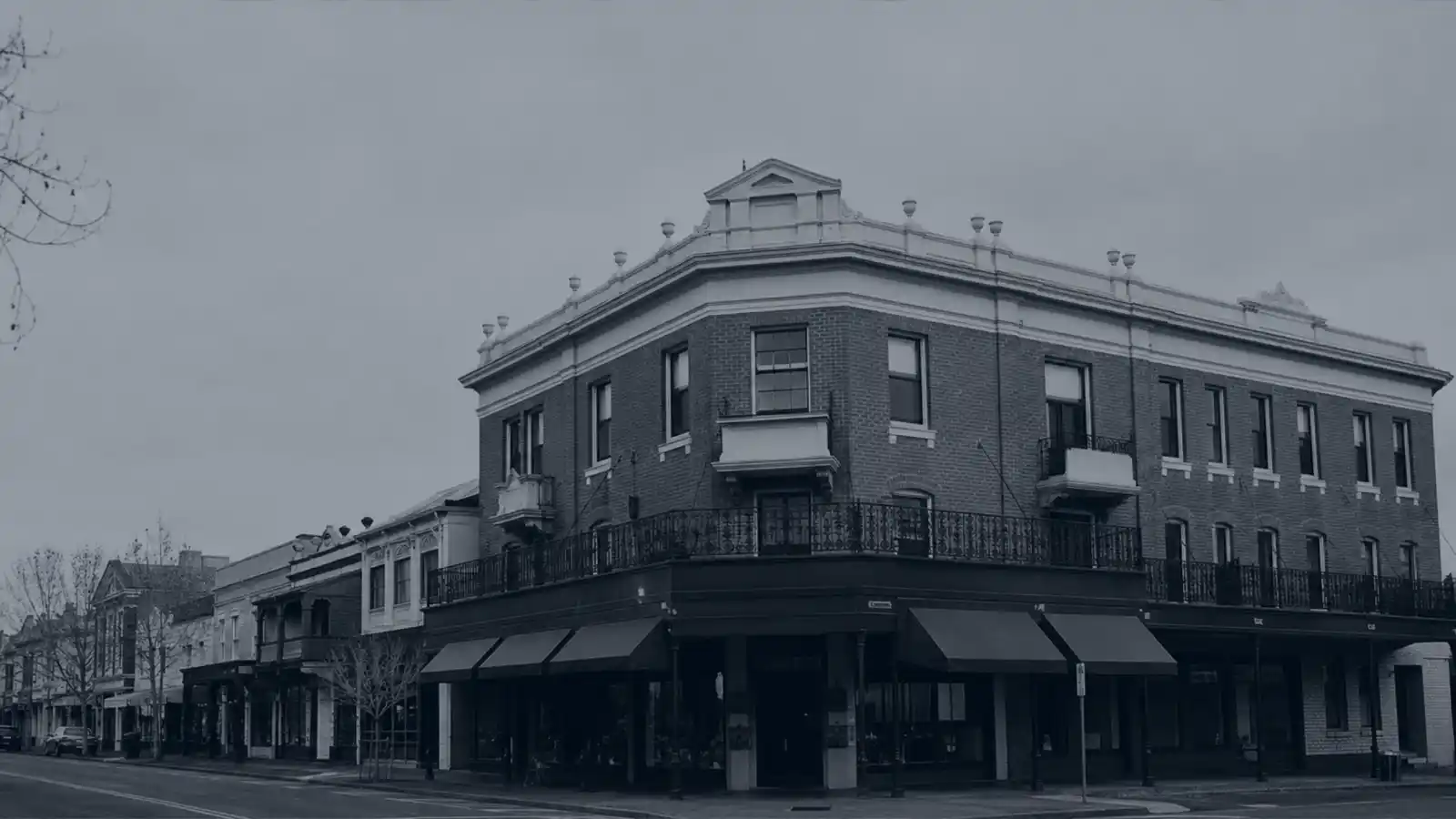 Corner building with shops below and apartments above, mixed-use strata insurance