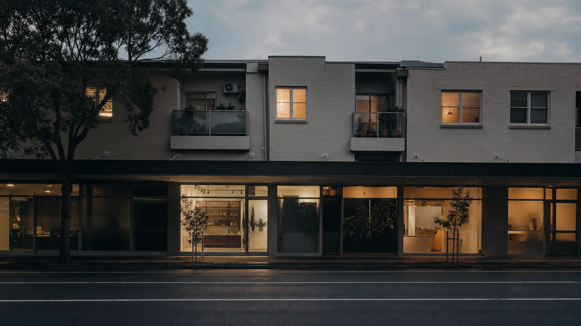 Mixed-use strata building at dusk, get a mixed-use strata insurance quote