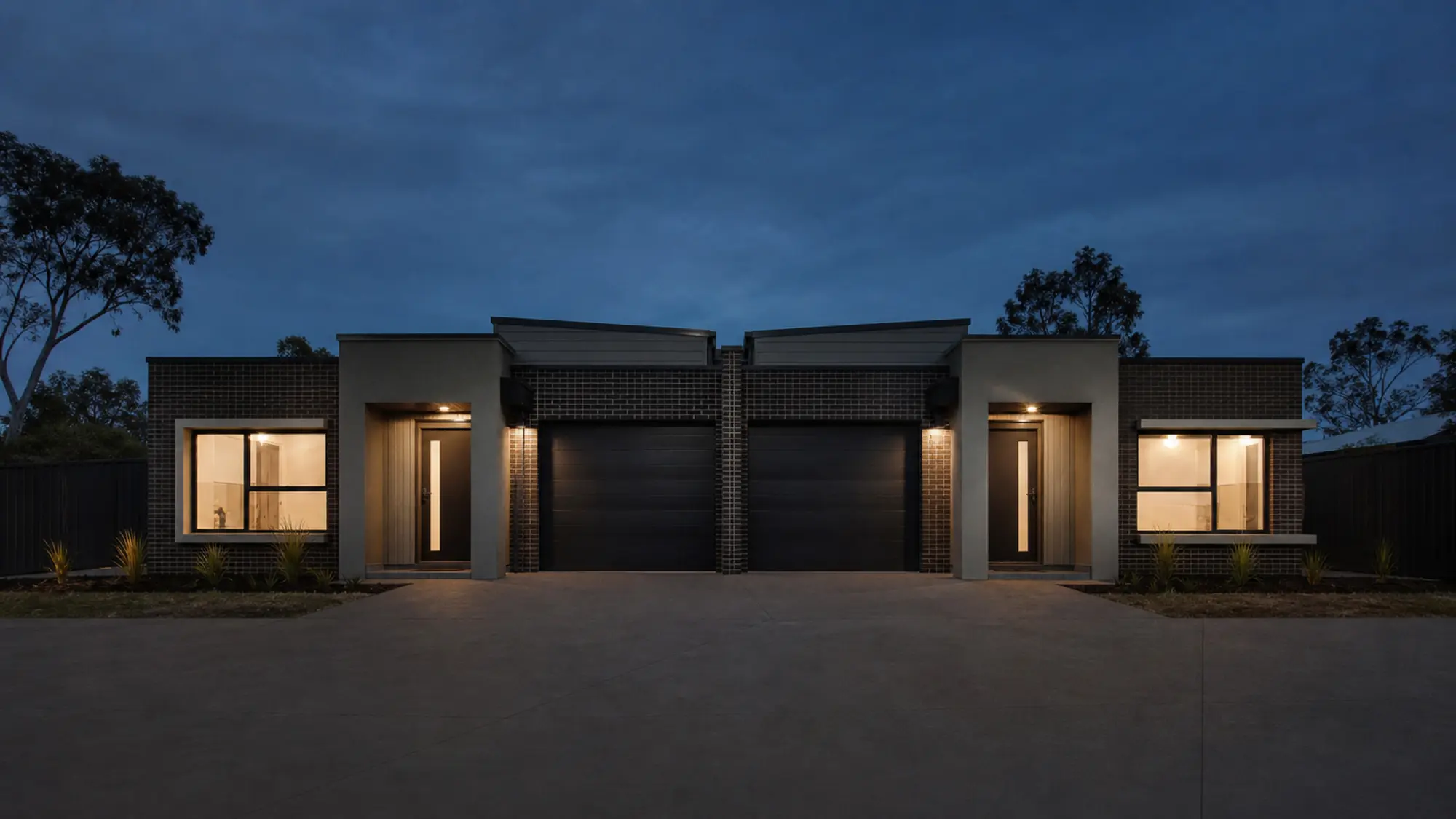 Accessible SDA duplex at dusk for NDIS property insurance