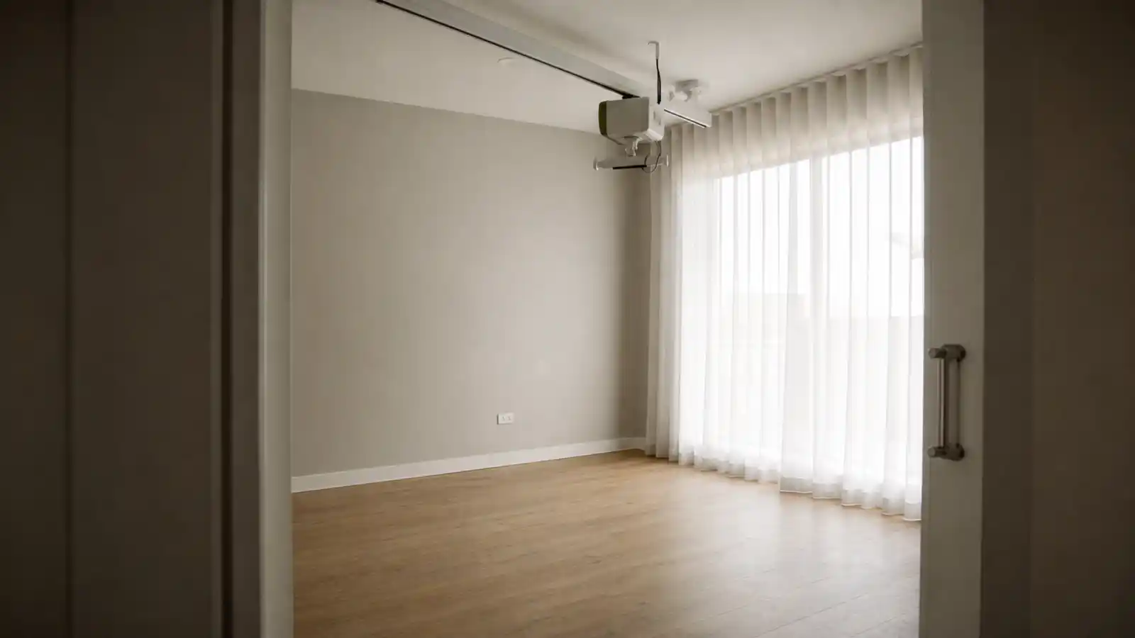 Empty accessible bedroom with ceiling hoist track for SDA vacancy insurance