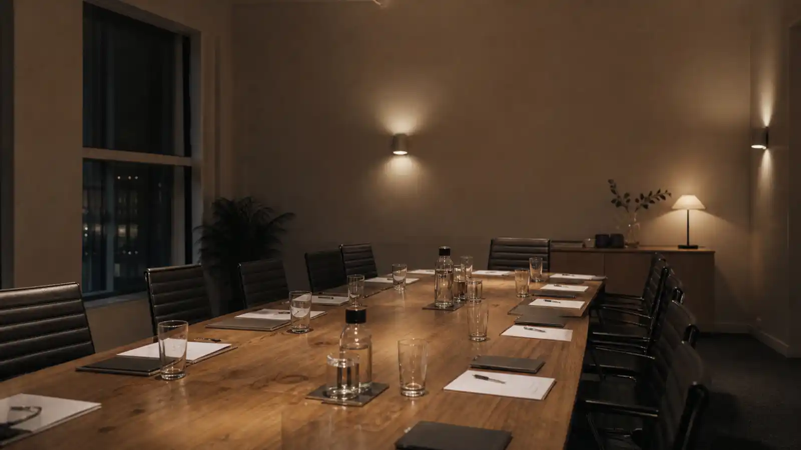 Strata committee meeting table set with agenda papers, office bearers liability insurance