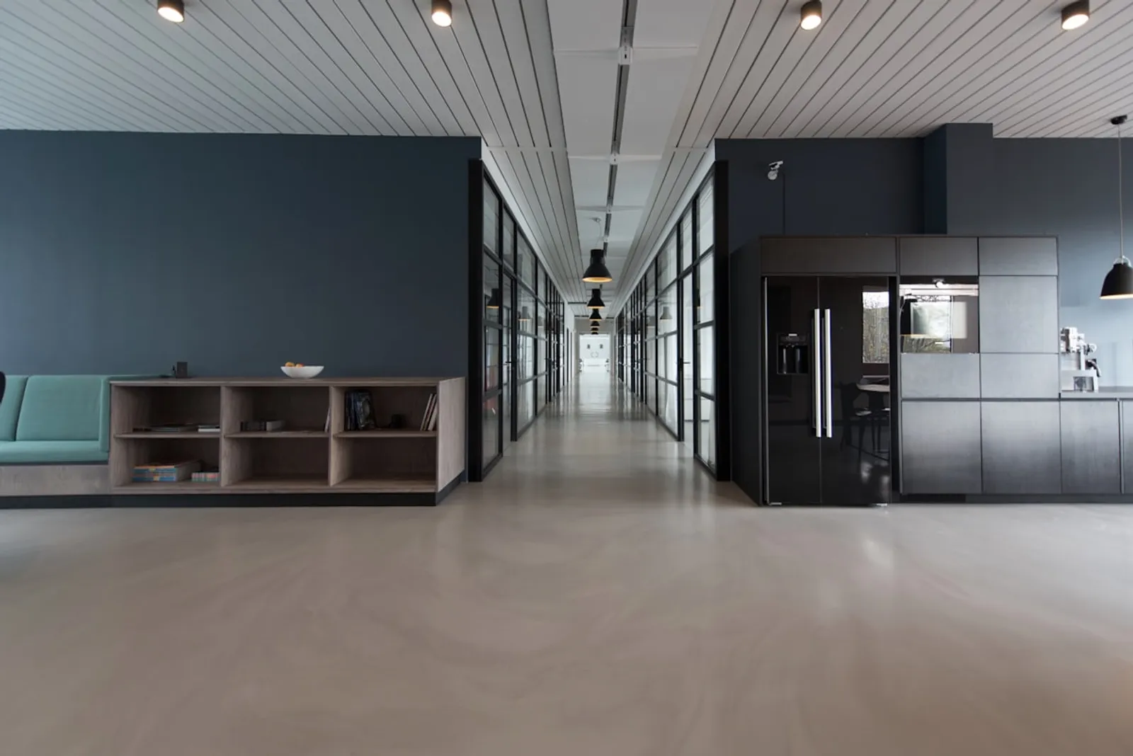 Modern commercial building interior with multiple levels representing commercial strata complexity