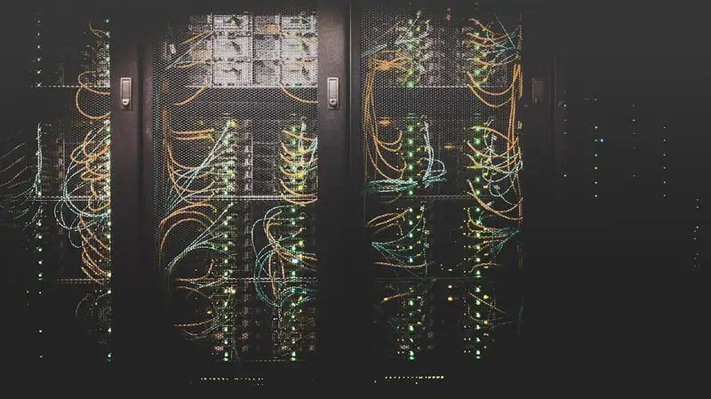 Interior of data centre with server racks and networking infrastructure