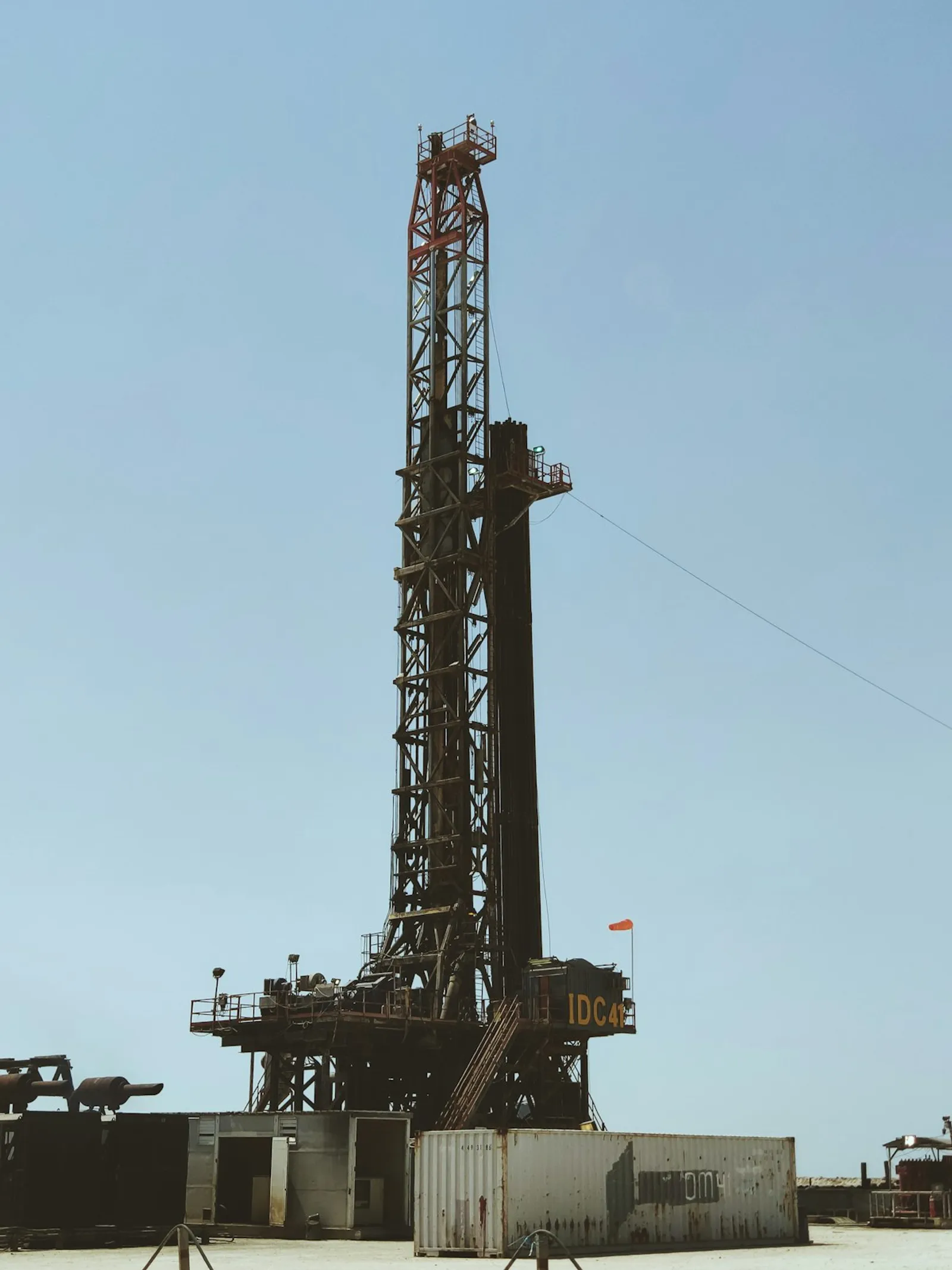 Professional meeting discussing petroleum engineering insurance requirements