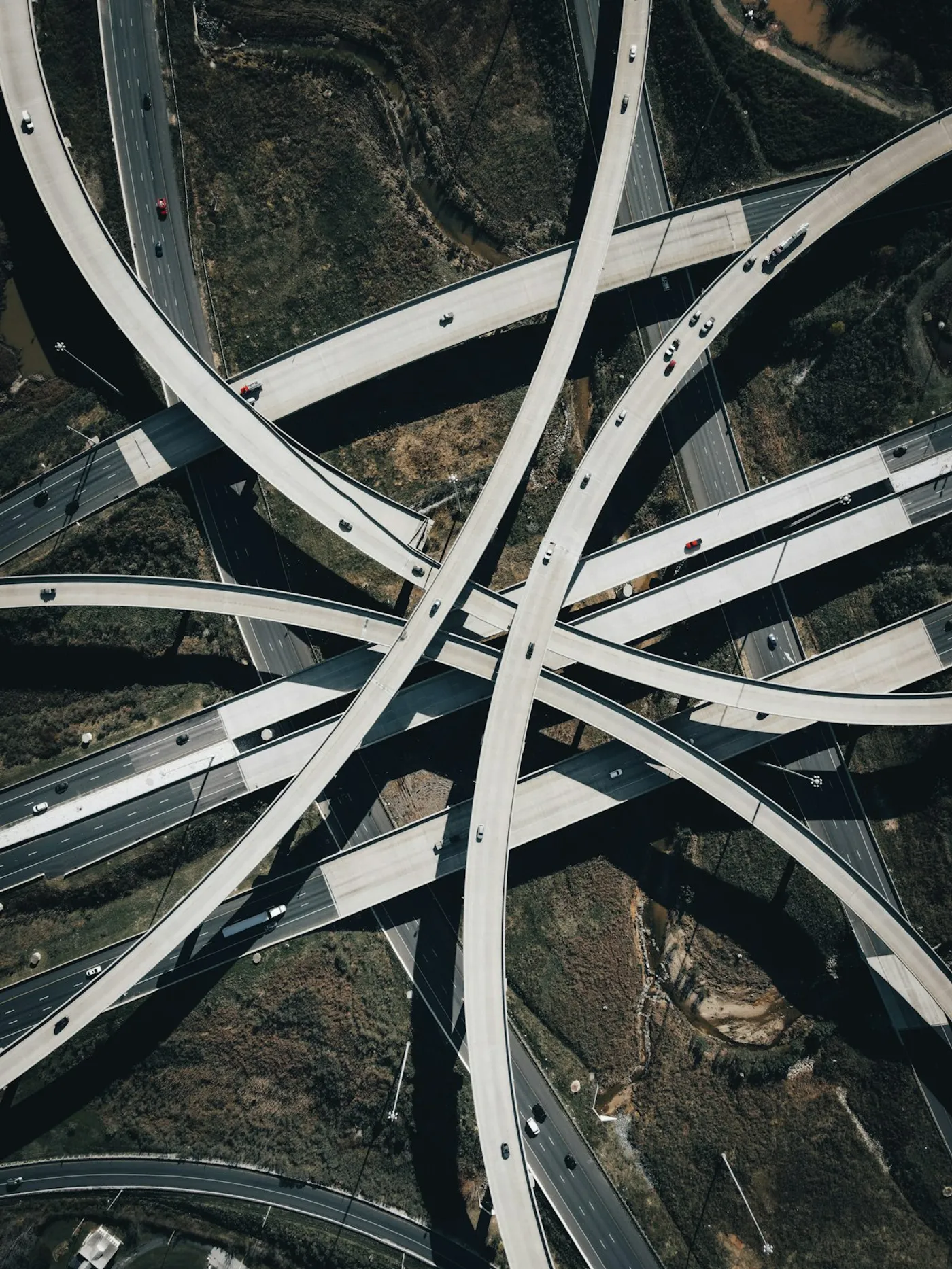 Aerial view of road overpass and intersection representing traffic engineer PI coverage