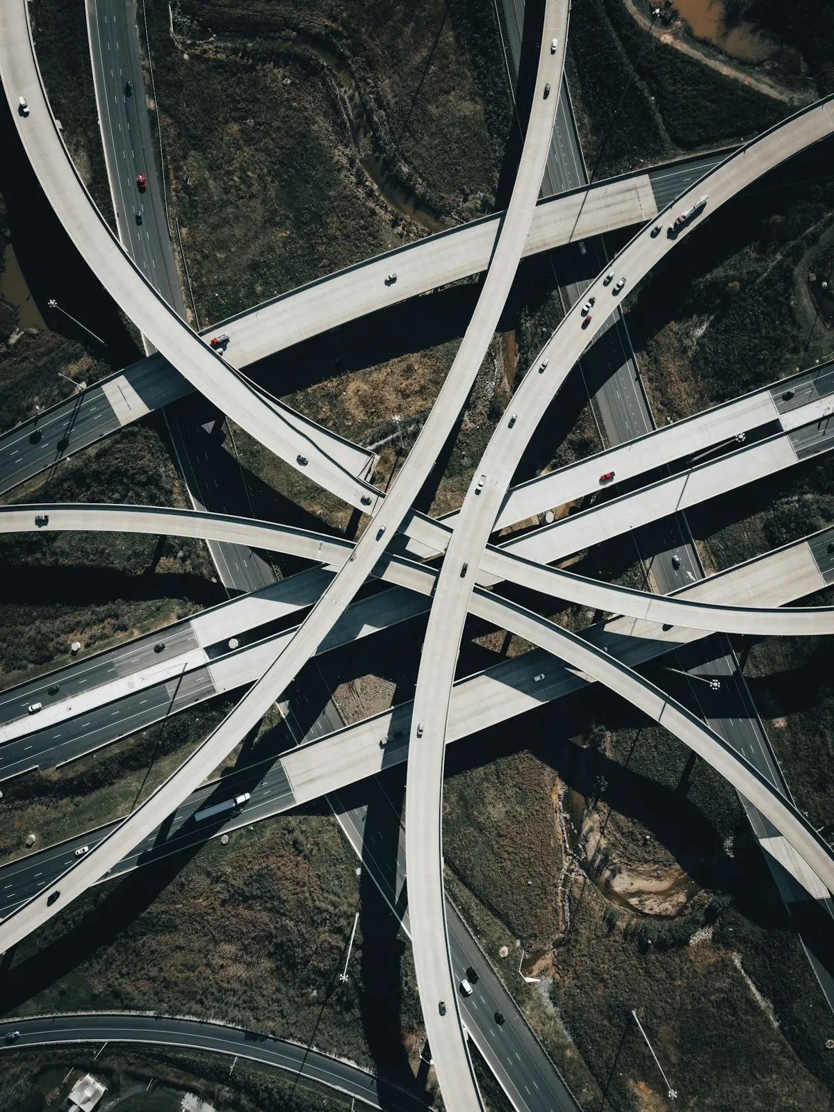 Aerial view of road overpass and intersection representing traffic engineer PI coverage