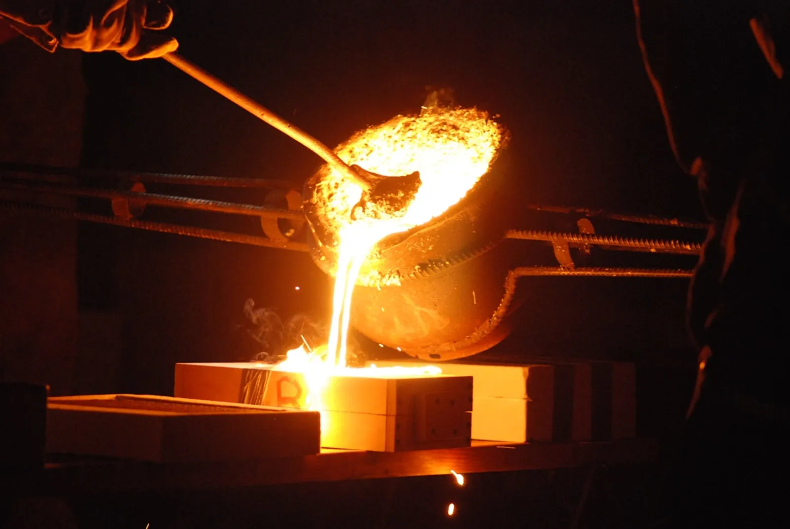 Professional meeting discussing materials engineering insurance requirements