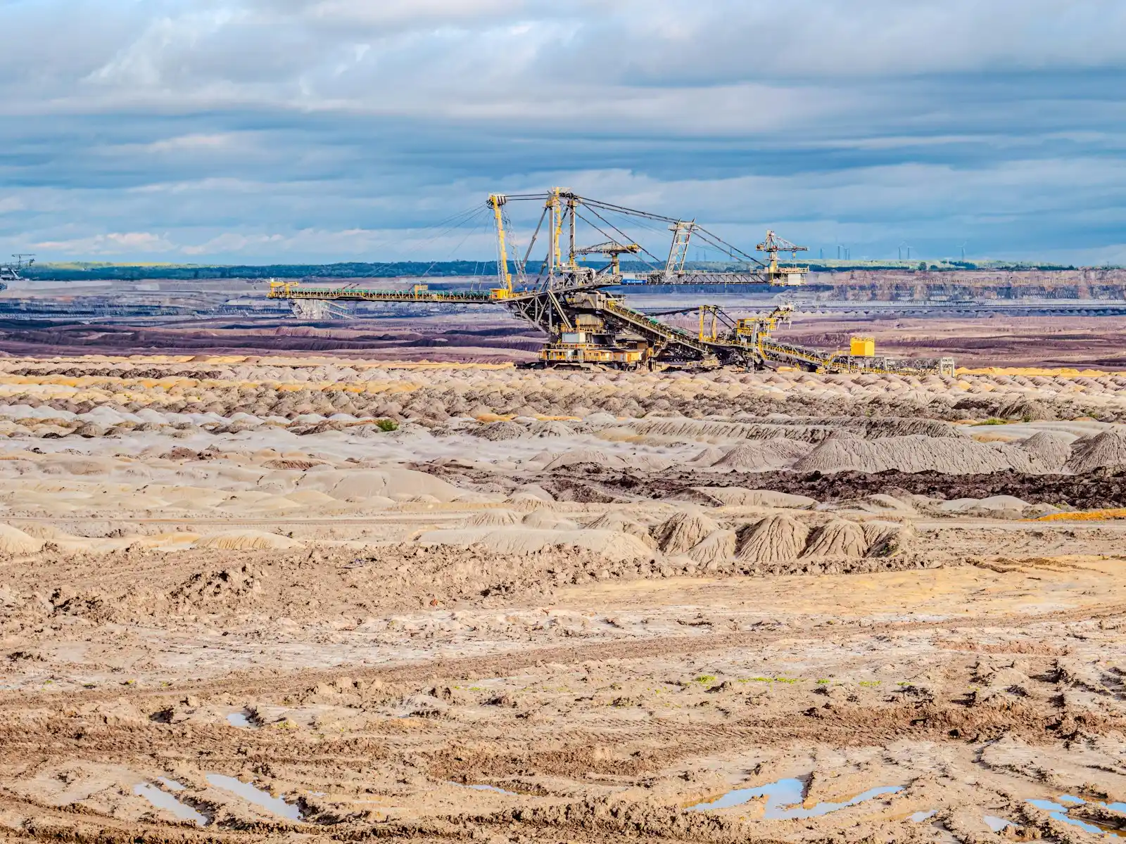 Large excavator in open-pit mine representing mining engineering professional liability