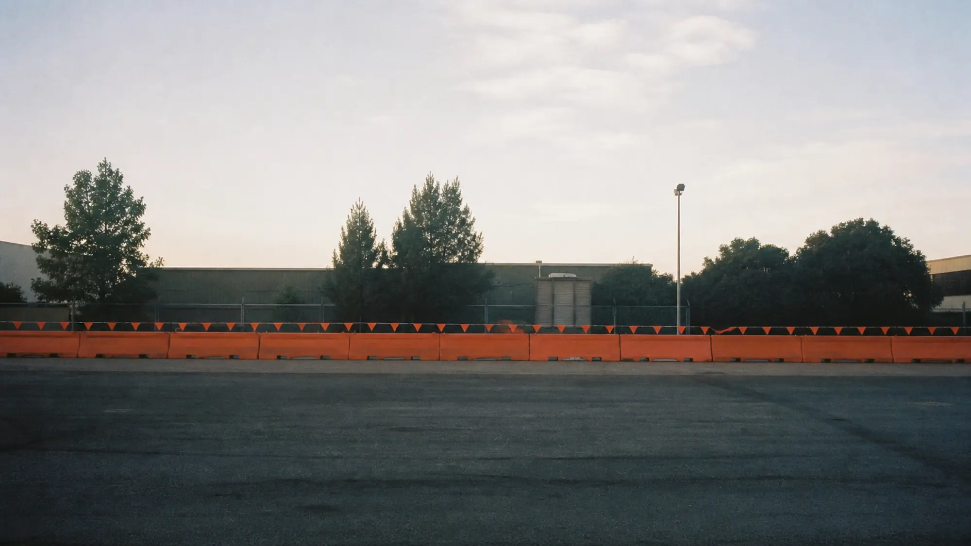 Safety barriers across an industrial yard - safety engineer insurance quote