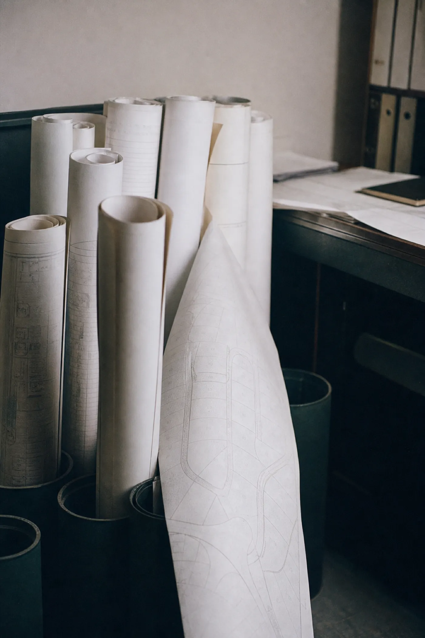 Rolled development plans, application documents behind town planner professional indemnity cover