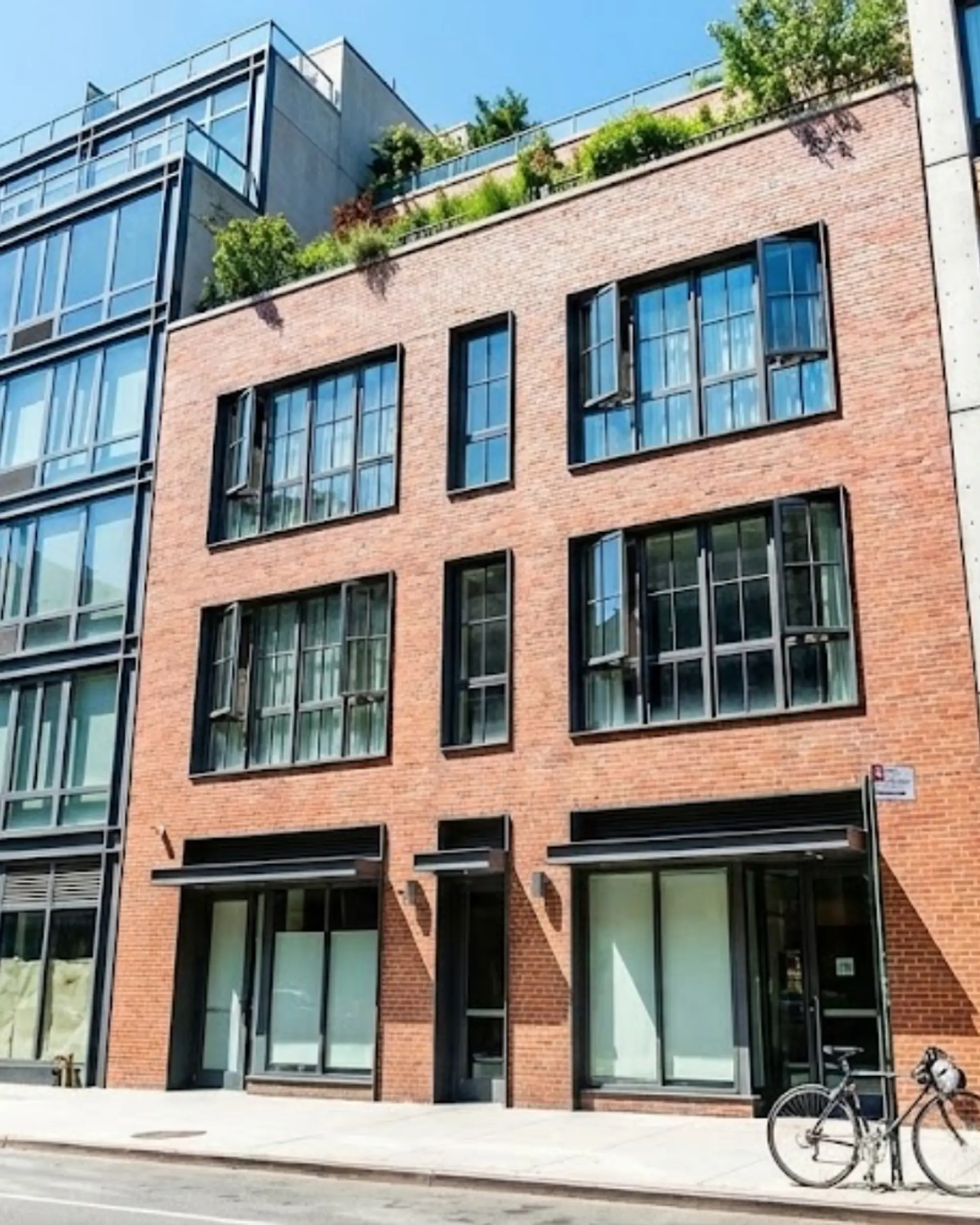 Urban mixed-use brick building with retail and office spaces